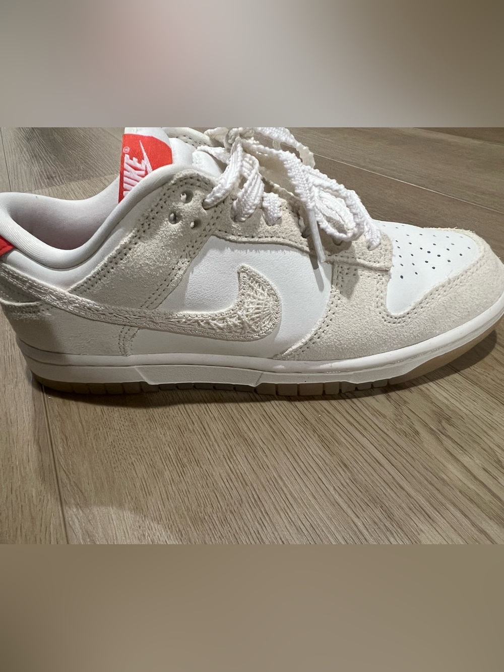 Nike women’s Cream and White Low-Top Sneakers with crochet Swoosh